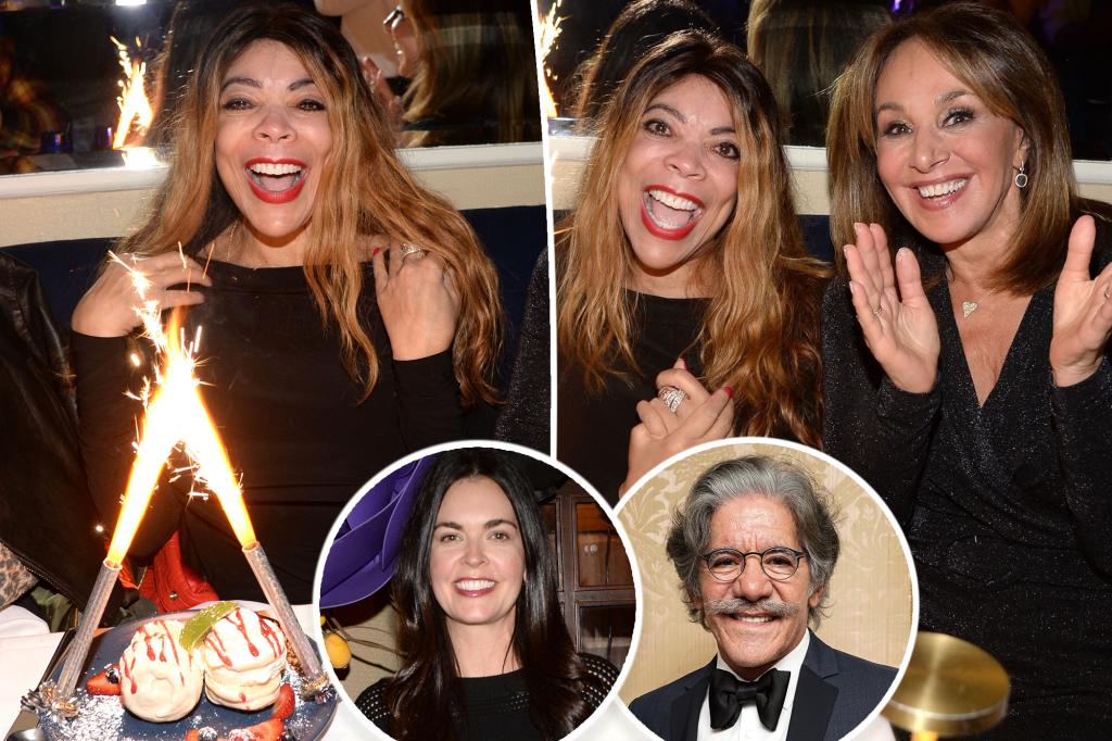 Wendy Williams dancing with patron at power eatery