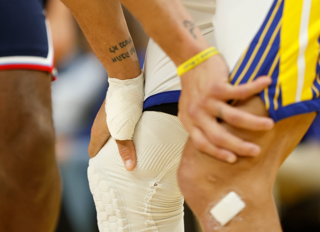 Warriors’ Steph Curry, Jimmy Butler nurse injuries entering play-in game