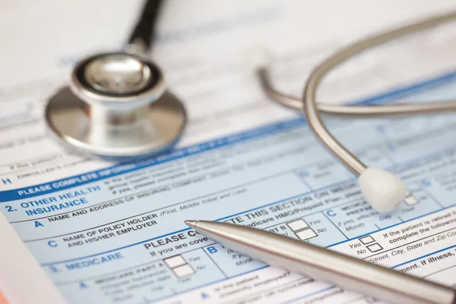 1 in 4 workers stay in unwanted jobs for health coverage, survey finds